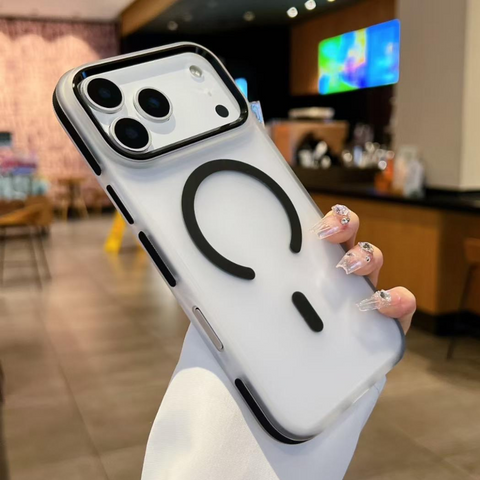 Phone case with a unique design held by a hand in an indoor setting